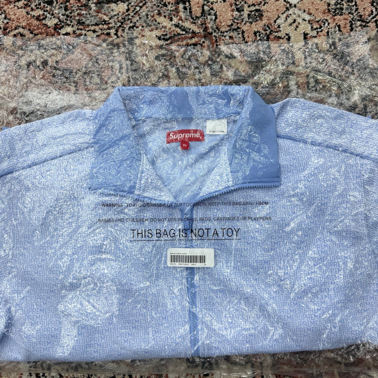Supreme Repeat Logo Baby Blue Track Jacket SZ XL (NEW)