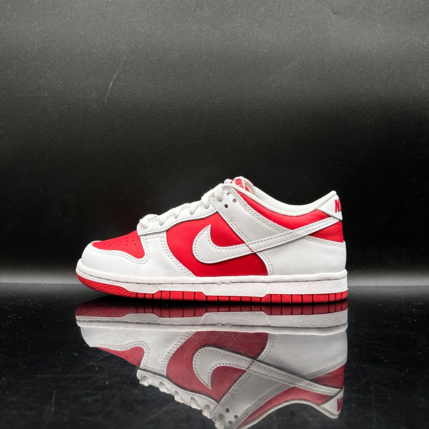 PRE-OWNED Nike Dunk Low Championship Red SZ 4.5Y